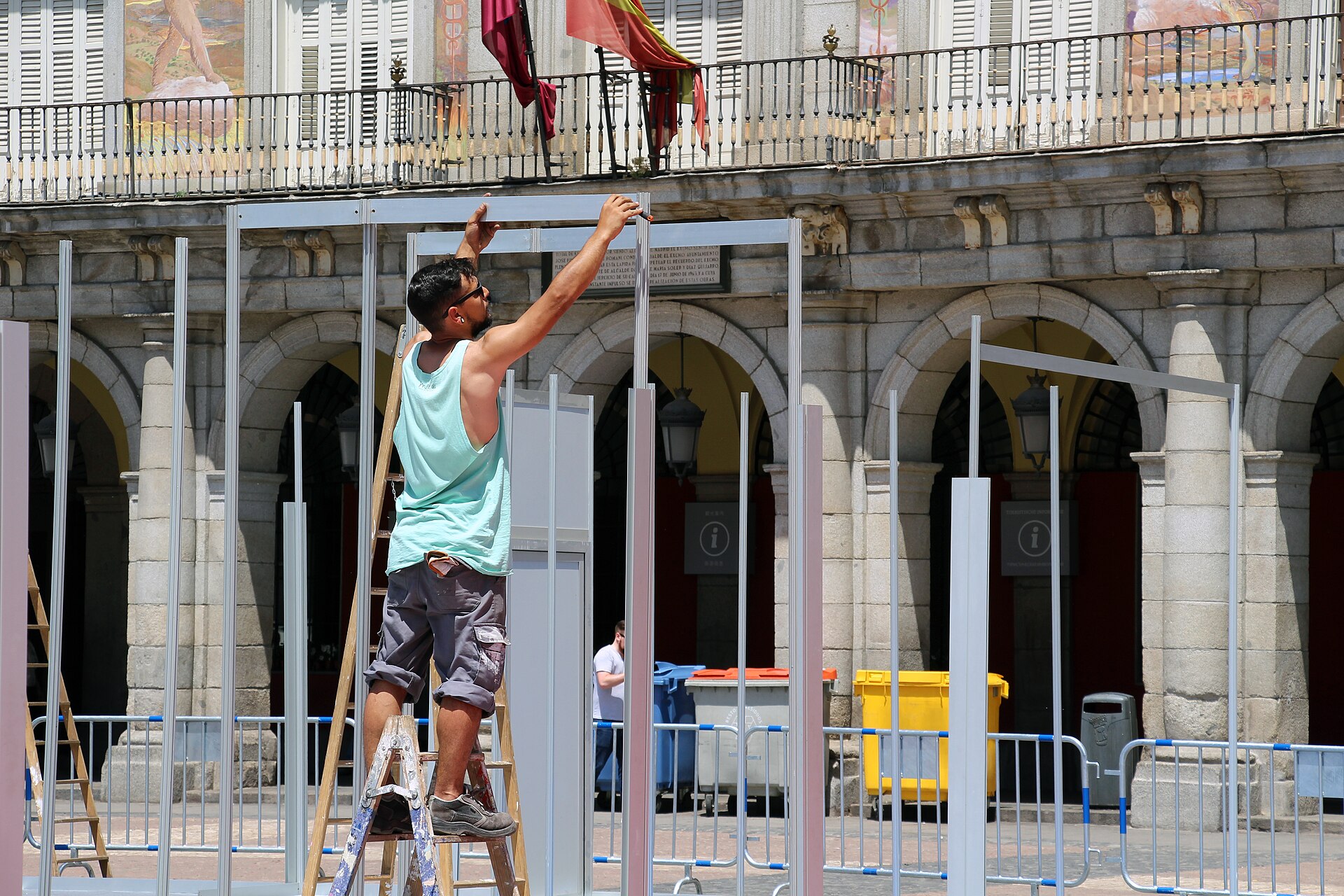 Crews setting up an event in the Plaza Mayor in Madrid's Los Austrias quarter
