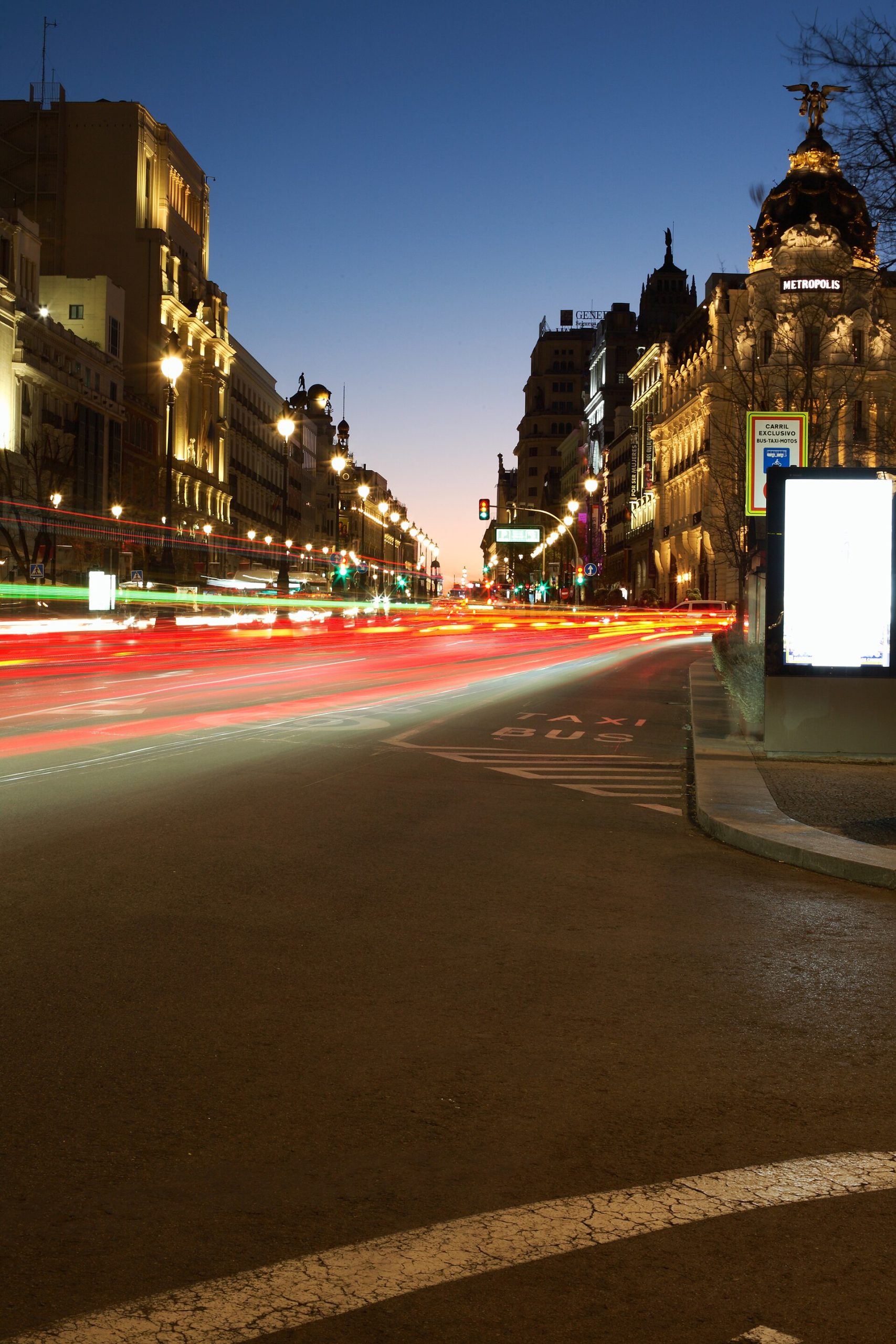 Calle de Alcalá at its junction with Calle del Barquillo, Madrid, at dusk