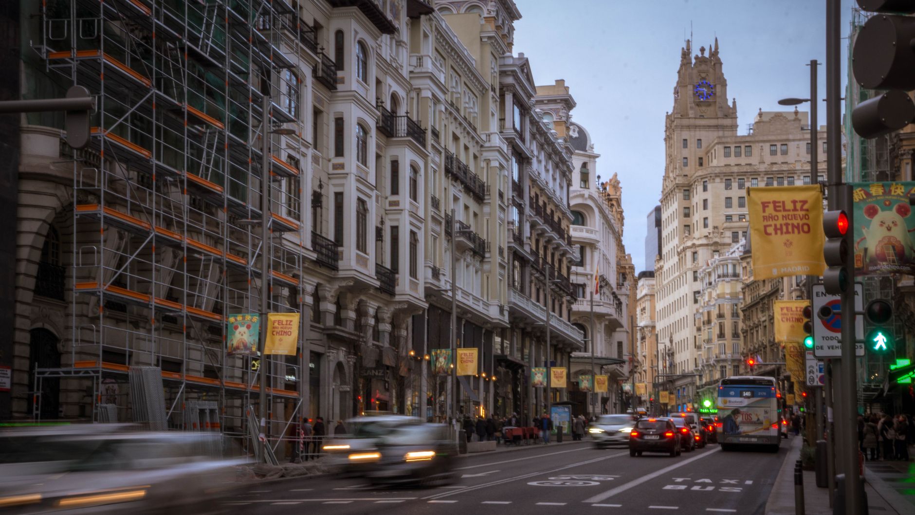 View of Gran Via street in Madrid featuring iconic Telefonica Building and urban scenery. — illustrating How Is Madrid Divided Into Districts and Barrios?
