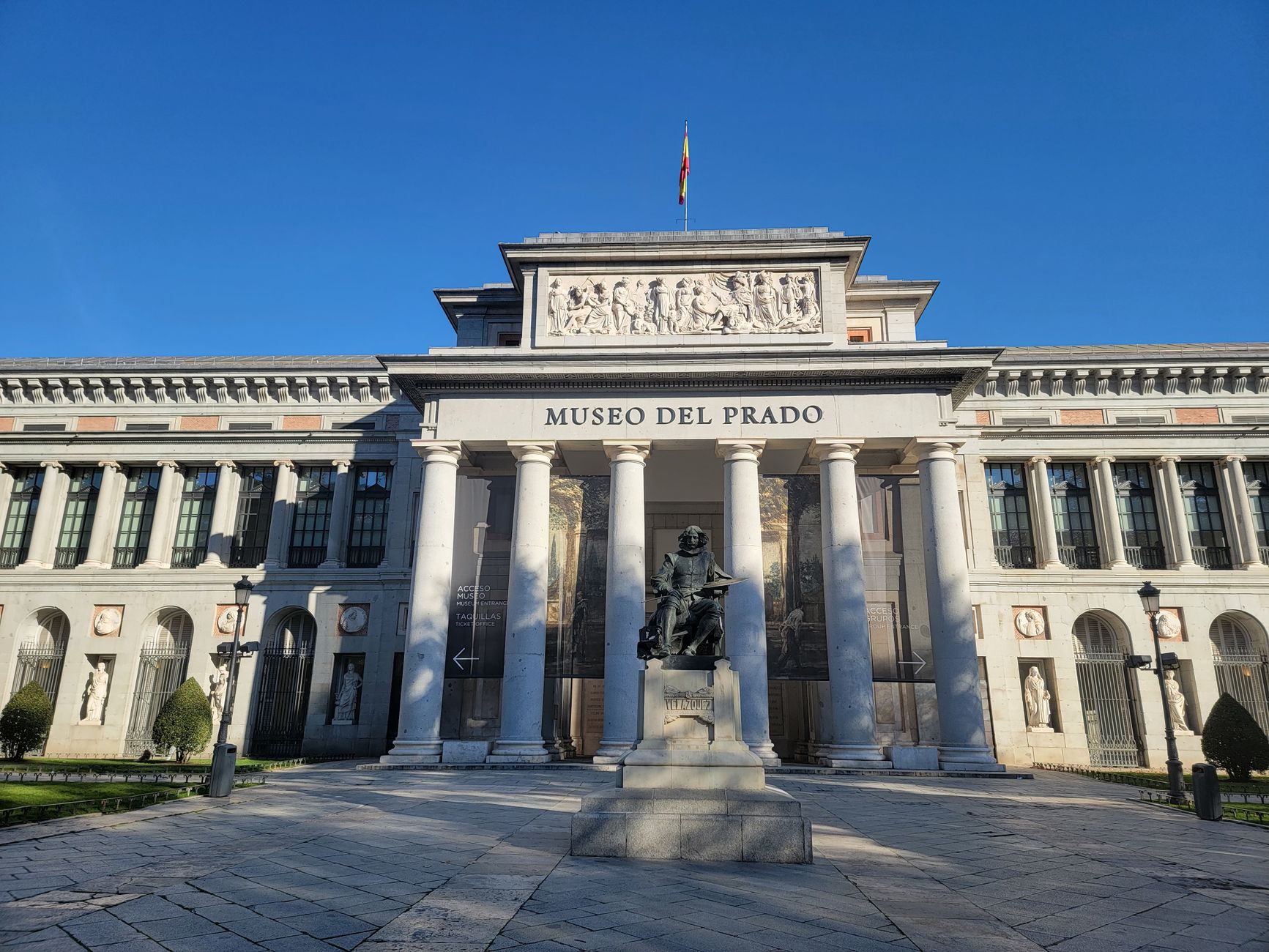 Prado Museum's iconic facade under clear blue skies in Madrid, Spain. — illustrating What Is the Museo Lázaro Galdiano in Madrid?