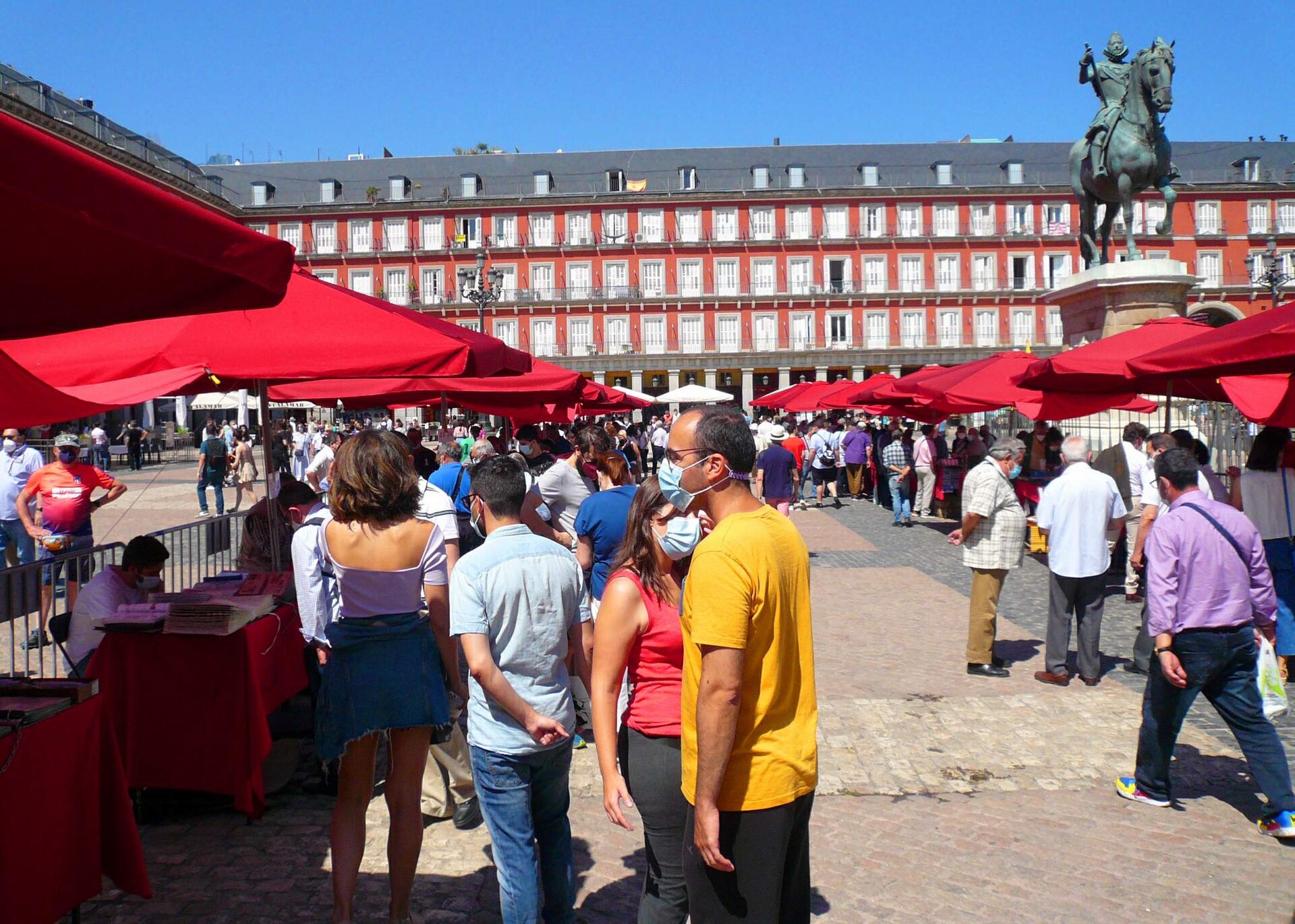 Stalls of the stamp and coin market in Madrid's Plaza Mayor, June 2021