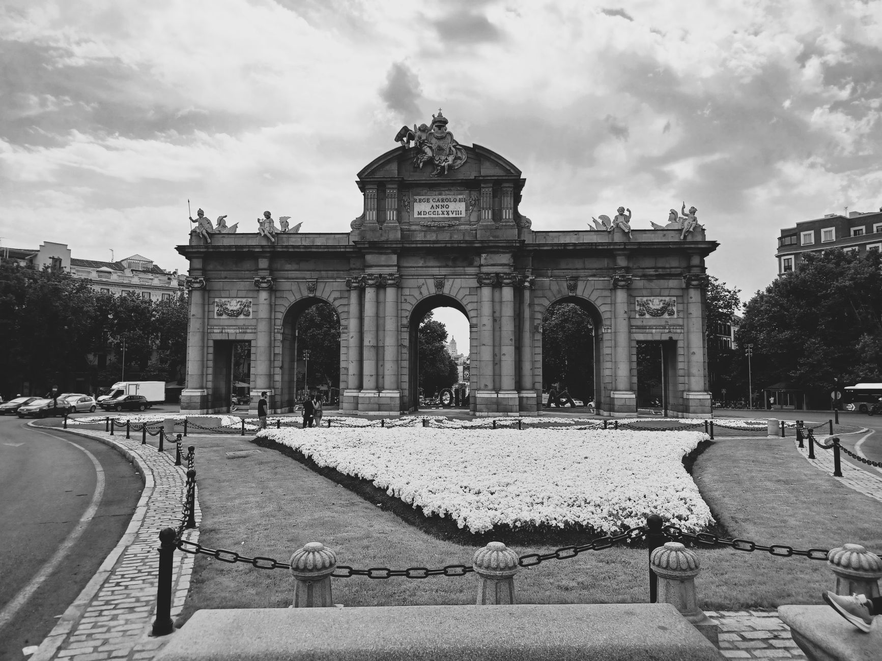 Monochrome image of the iconic Puerta de Alcalá archway in Madrid, Spain
