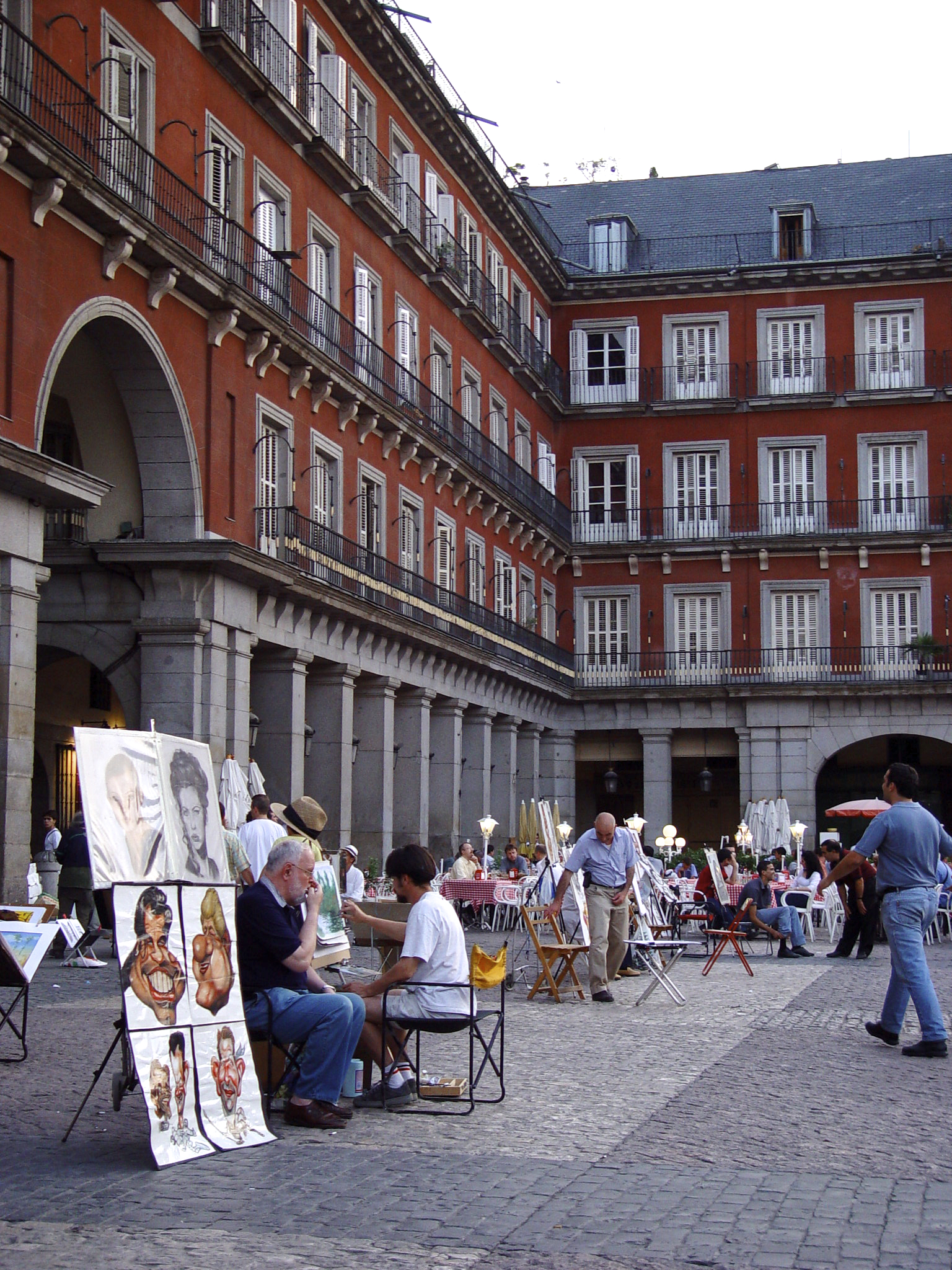 Painters at work in the Plaza Mayor in Madrid