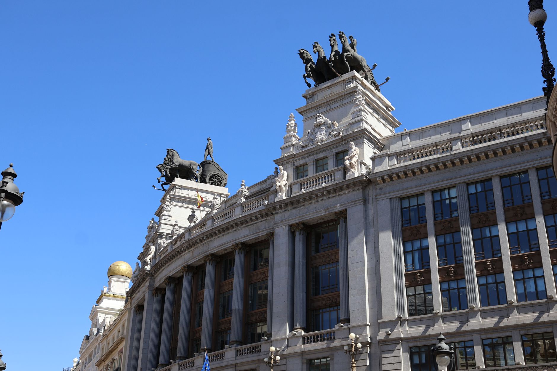 Majestic view of historic architecture in Madrid, Spain under a clear blue sky