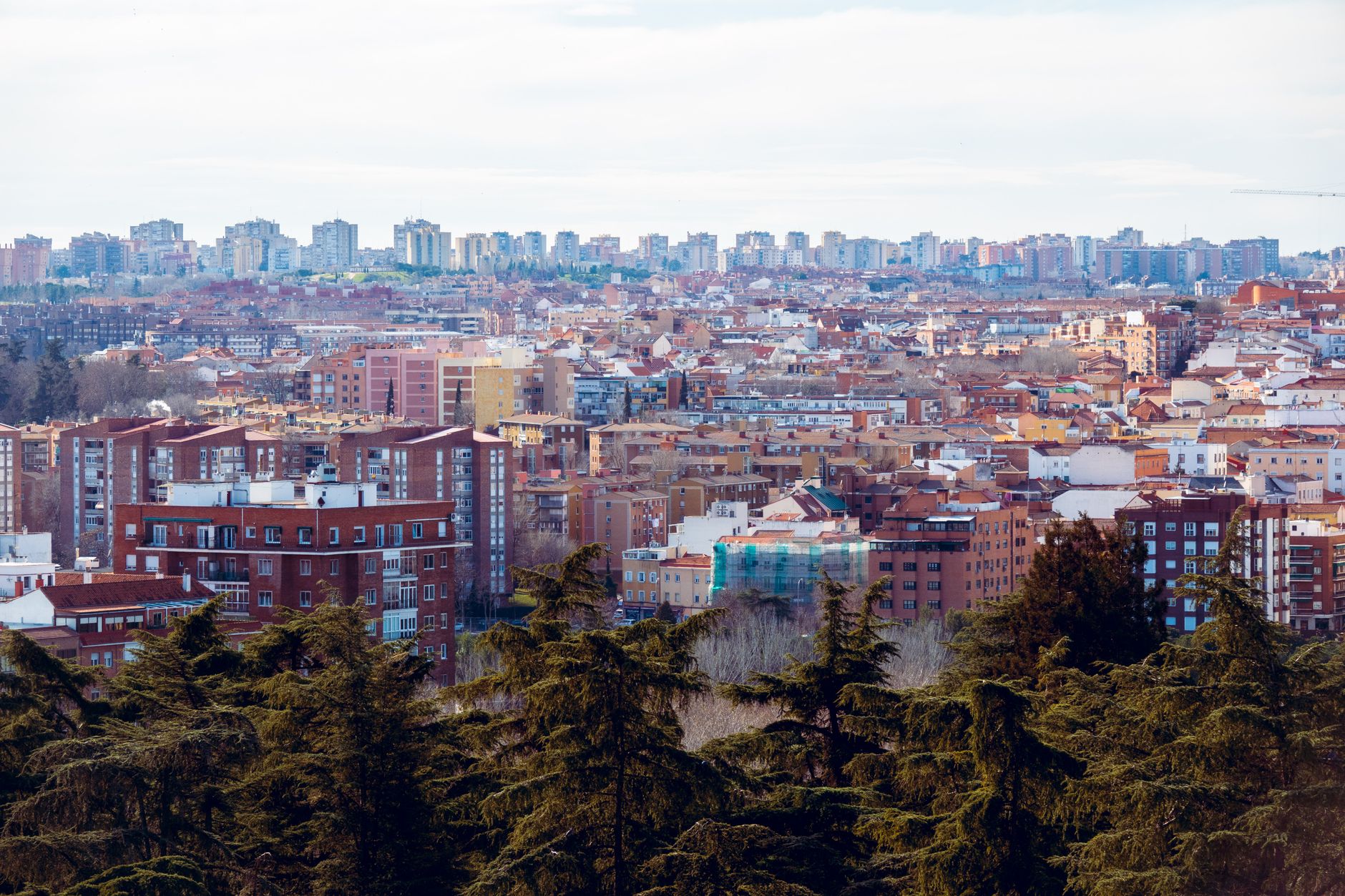 Aerial view of the vibrant cityscape of Madrid, showcasing diverse urban architecture under a clear sky. — illustrating What Is San Isidro, and Roughly When Does It Fall?