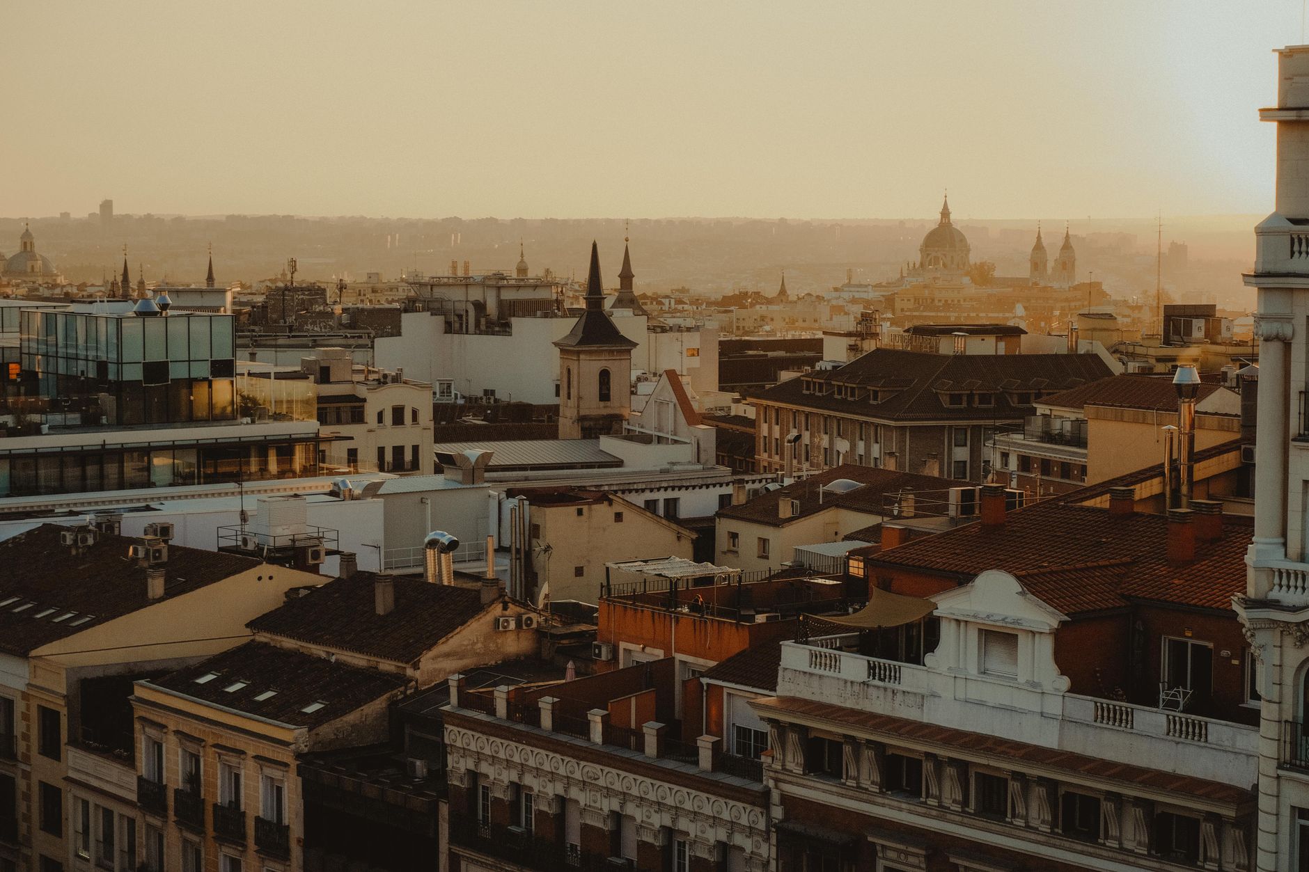 Scenic panorama of Madrid's rooftops and skyline at sunset. — illustrating What Happens to Madrid in August? A Clear Guide