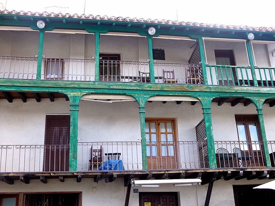 Green-painted wooden balconies around the Plaza Mayor in Chinchón
