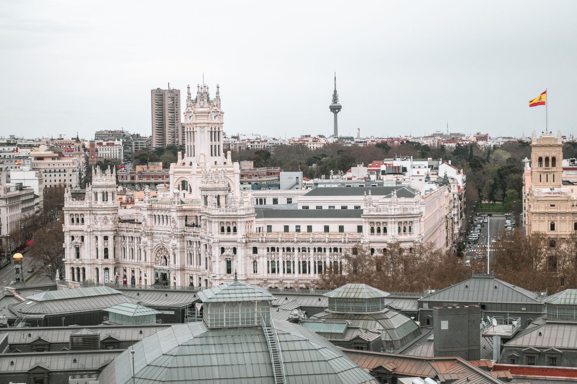 Captivating aerial view of the iconic Palacio de Cibeles and Madrid cityscape, Spain.